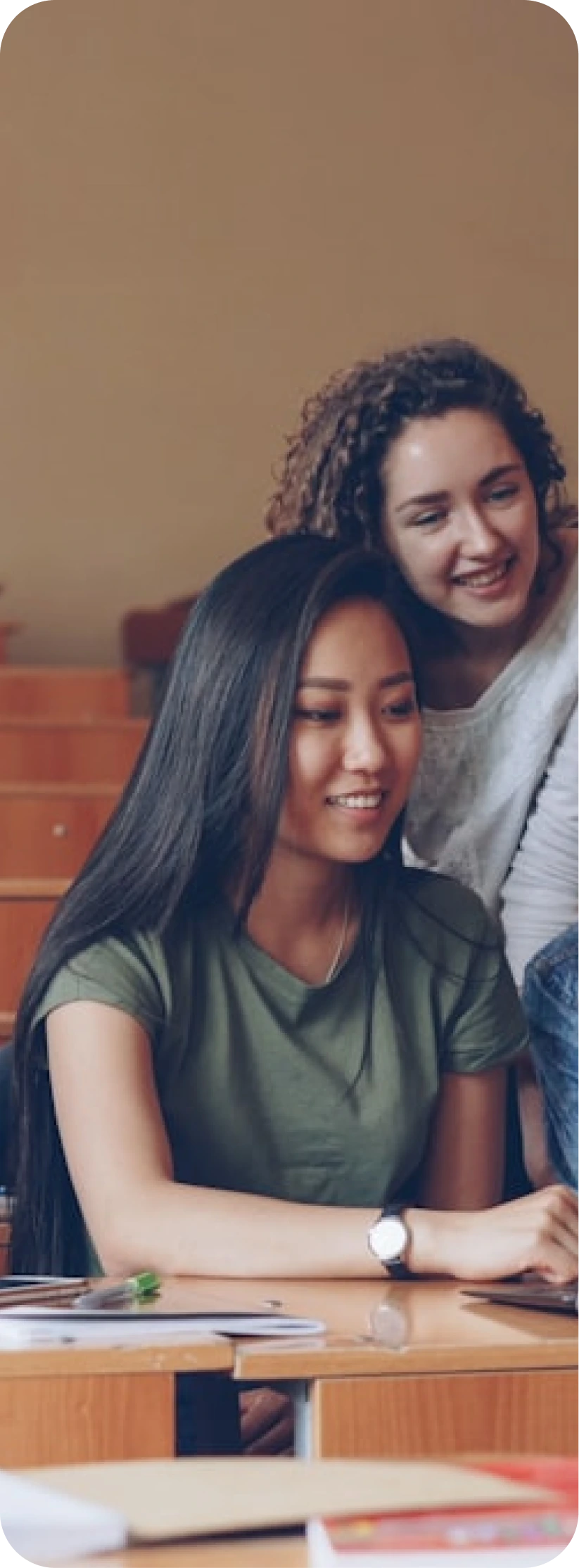 Young women smiling together